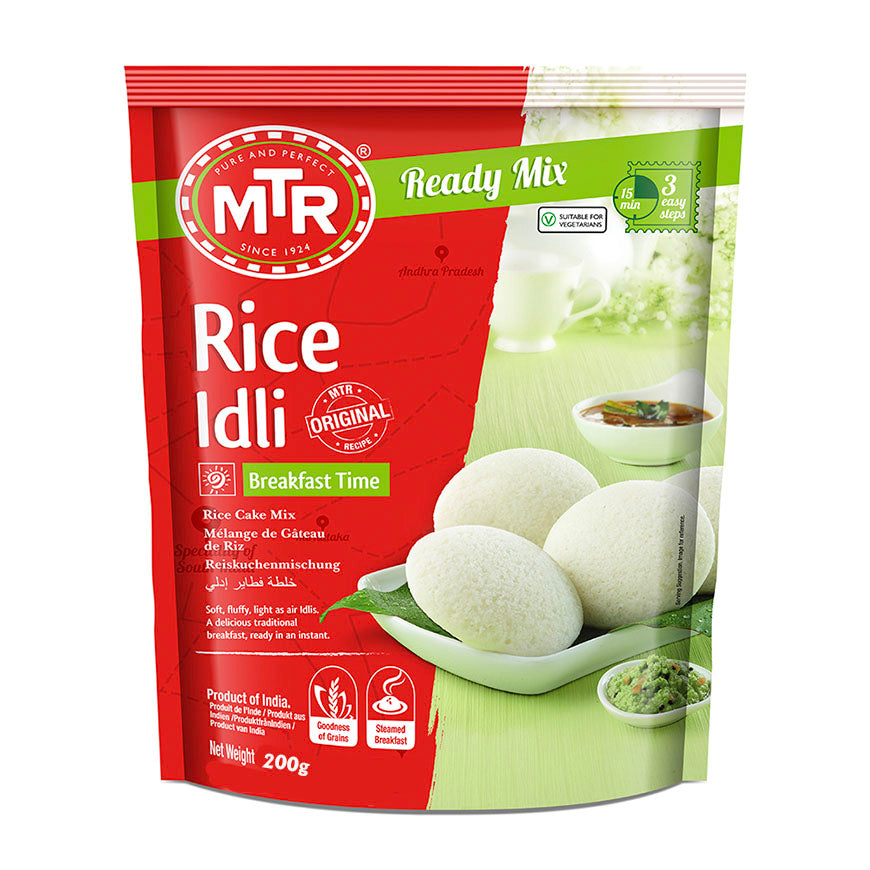 Aromatic Cooking: Soft And Fluffy Idlis ( Steamed Rice Cakes )